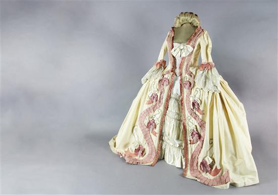 Countess Almavivas costume for The Marriage of Figaro. A cream silk dress, under skirt, looped petticoat and blonde